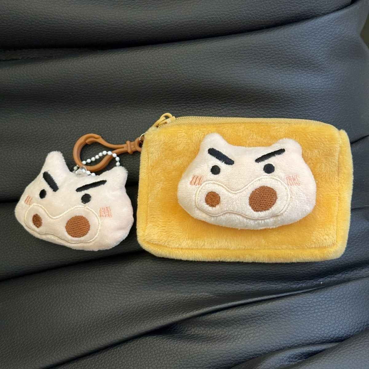 Monedero de peluche de dibujos - Headphone Parts reseña y precio